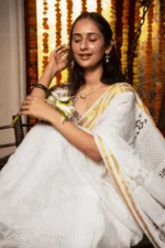 Kota Chikankari Saree for Onam with Elegant Cutwork Detailing - Image 5
