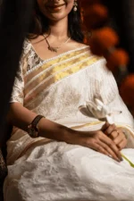 Kota Chikankari Saree for Onam with Elegant Cutwork Detailing - Image 9