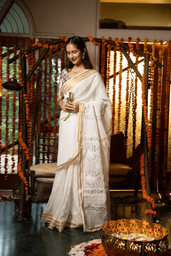 Kota Chikankari Saree for Onam with Elegant Cutwork Detailing - Image 1