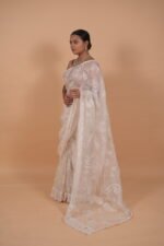 White Organza saree with cutwork and tapechi