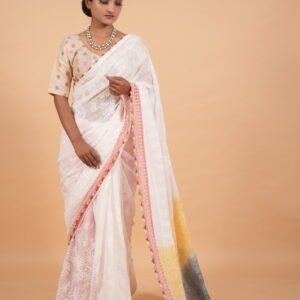 Cream color tapechi kota saree with multicolored pallu