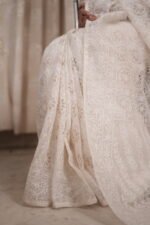 White colored silk organza saree with delicate tapechi embroidery and cutwork - Image 4