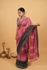 Pink cheque organza saree with black blouse and border