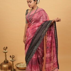 Pink cheque organza saree with black blouse and border