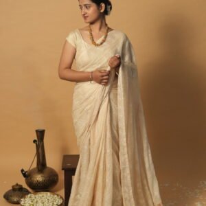 Cream kota saree with all over tapechi embroidery