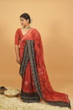 Bright red kota saree with black highlighting on border