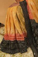 Yellow saree with black pallu shaded border in red and black - Image 3