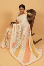White Kota saree with orange shading with embroidered border and java lining