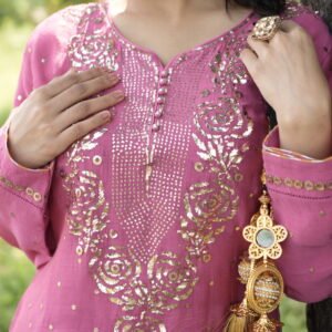 Woman in pink traditional attire