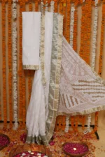Ivory Heritage Onam Kota Tapechi Saree