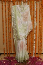 Emerald Bloom Onam Kota Tapechi Saree