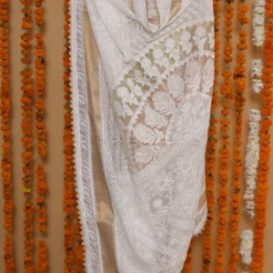 Ivory Java Cutwork Onam Kota Tapechi Saree