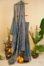 Emerald Blue Tissue Saree with Tapechi Embroidery.